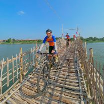 Biking tour on the Mekong River Biking tour on the Mekong River by the Bamboo bridge